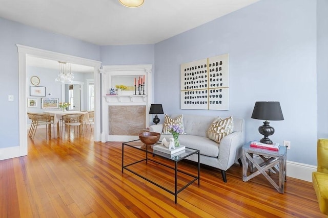 41 Sudan St Unit 3, Boston, MA 02125 - living room with hardwood / wood-style flooring and a chandelier