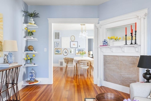 41 Sudan St Unit 3, Boston, MA 02125 - living room with wood finished floors and a chandelier