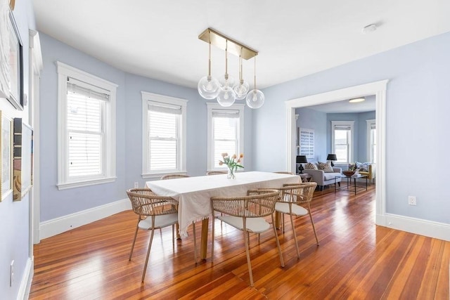 41 Sudan St Unit 3, Boston, MA 02125 - dining space with wood finished floors and a chandelier