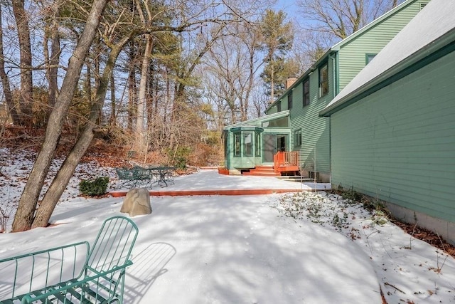 view of snow covered patio