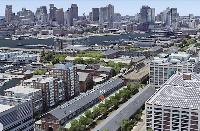 bird's eye view with a water view