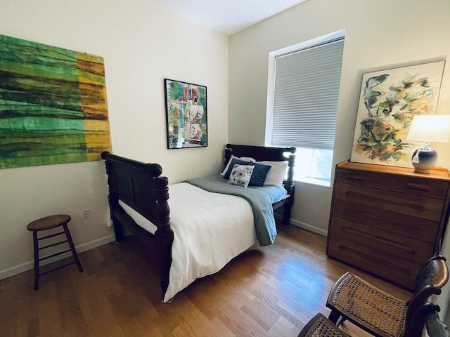 60 Glen Rd Unit 107, Brookline, MA 02445 - bedroom featuring wood finished floors and baseboards