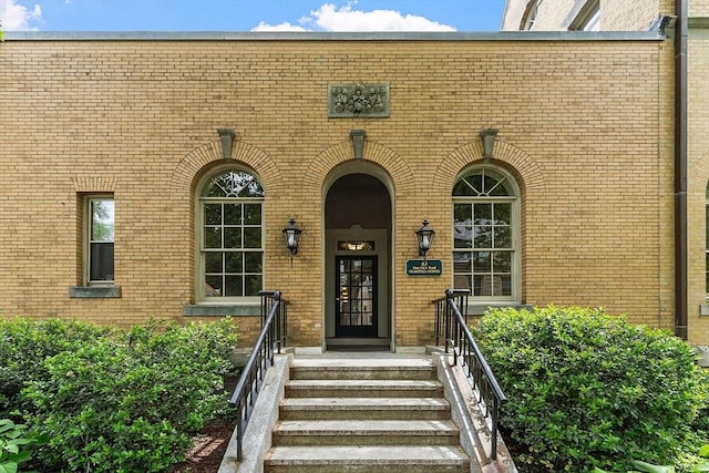 60 Glen Rd Unit 107, Brookline, MA 02445 - doorway to property featuring brick siding