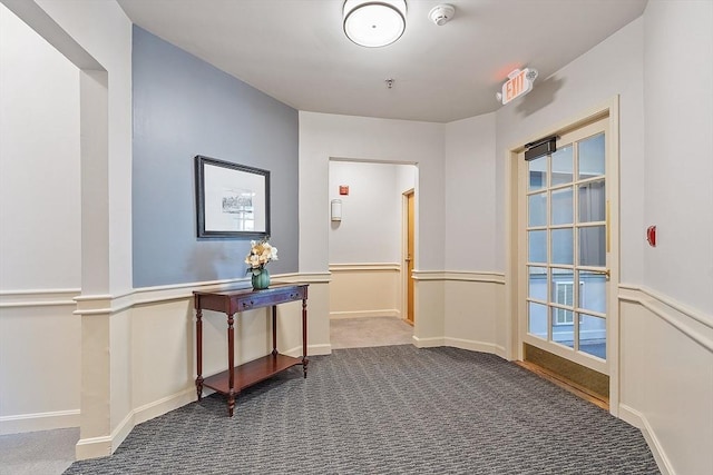60 Glen Rd Unit 107, Brookline, MA 02445 - hallway featuring dark carpet