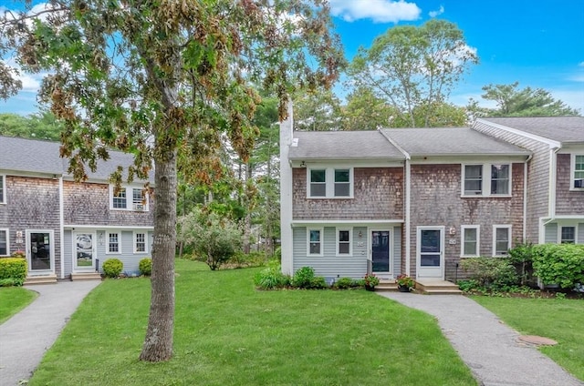 300 Falmouth Rd Unit 12A, Mashpee, MA 02649 - townhome / multi-family property with a front yard and a chimney