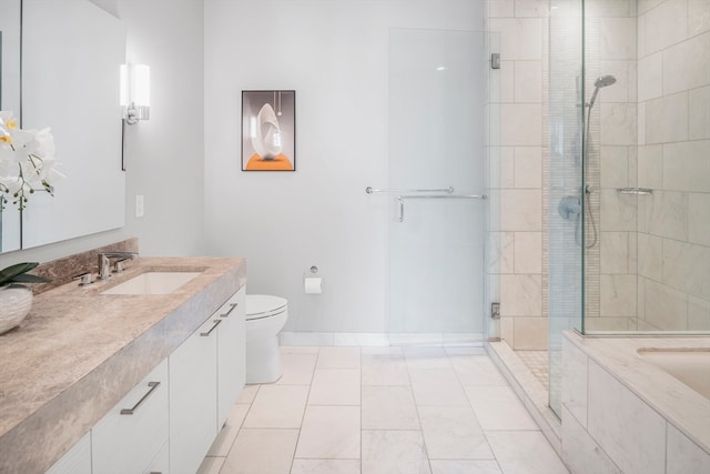 bathroom with tile patterned floors, walk in shower, vanity, and toilet