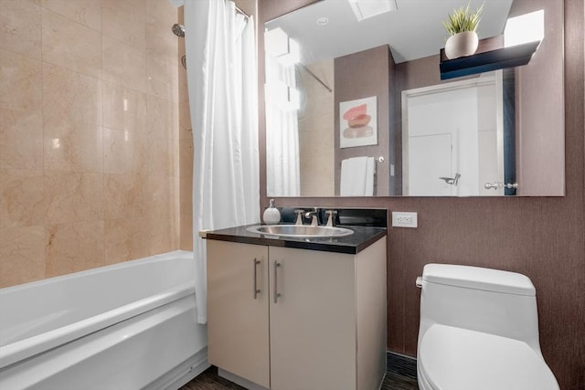 full bathroom with shower / bath combo, vanity, and toilet