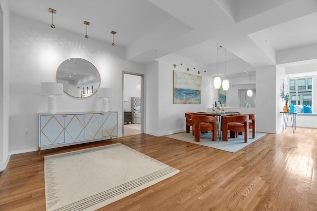 dining room with wood finished floors and baseboards