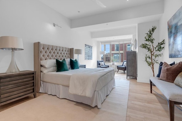 bedroom featuring recessed lighting and light wood-style flooring