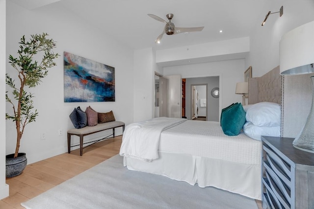 bedroom featuring ceiling fan and wood finished floors