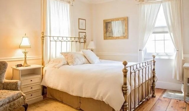 bedroom with light wood-style flooring