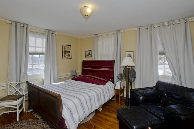 bedroom featuring dark wood-type flooring