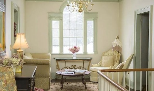 living area featuring a chandelier