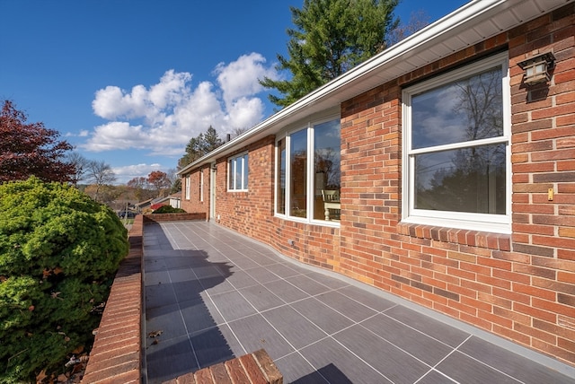 view of home's exterior with a patio