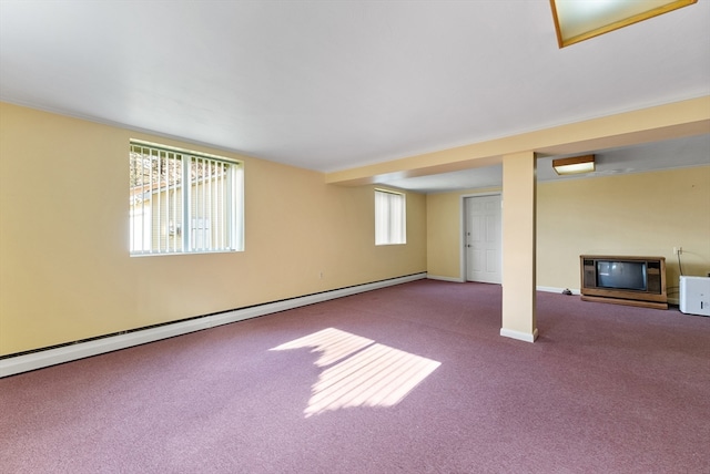 basement featuring a baseboard radiator and carpet floors