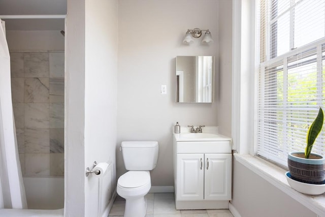 120 Charles St, Boston, MA 02114 - full bath featuring vanity, toilet, baseboards, and tile patterned floors