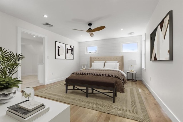 bedroom featuring visible vents, recessed lighting, baseboards, and light wood-style floors