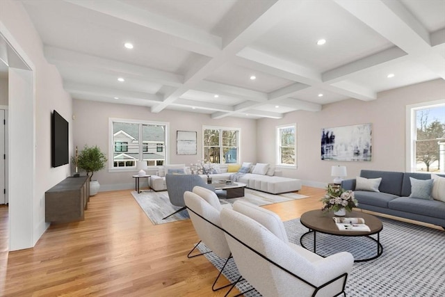 living area featuring beamed ceiling, recessed lighting, coffered ceiling, and light wood finished floors