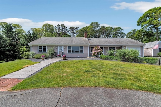 25 Pheasant Cove Cir, Yarmouth, MA 02675 - single story home featuring a chimney, a front yard, and a garage