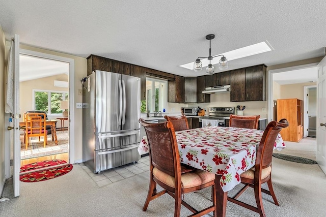 25 Pheasant Cove Cir, Yarmouth, MA 02675 - dining space featuring light colored carpet, a skylight, and a textured ceiling