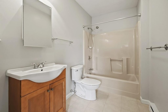 192 Pleasant St Unit 3, Leominster, MA 01453 - bathroom featuring vanity, toilet,  shower combination, tile patterned floors, and baseboards