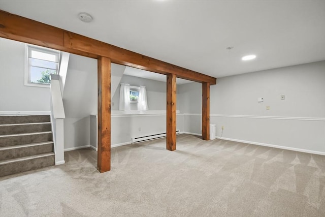 192 Pleasant St Unit 3, Leominster, MA 01453 - below grade area with a baseboard radiator, carpet floors, stairway, baseboards, and recessed lighting