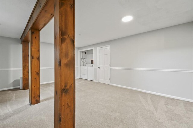 192 Pleasant St Unit 3, Leominster, MA 01453 - finished below grade area with carpet floors, washing machine and dryer, baseboards, and recessed lighting