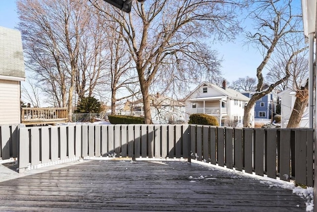 view of snow covered deck