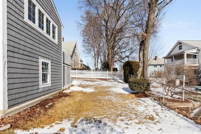 view of yard covered in snow