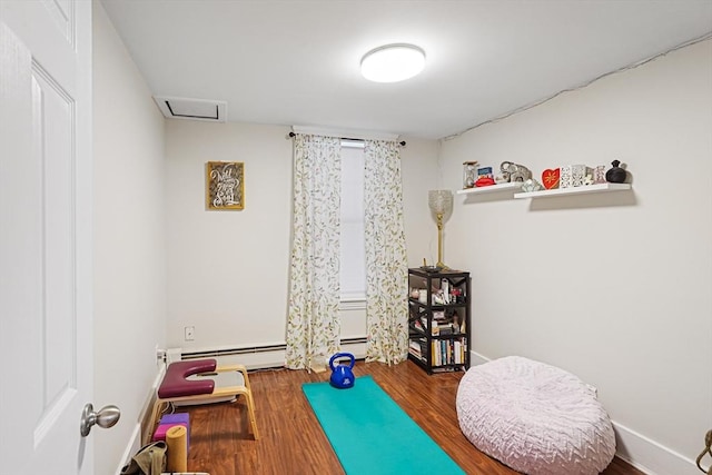 22 Tampa St, Worcester, MA 01604 - workout area featuring wood finished floors and baseboard heating