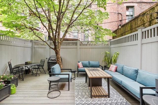 9 Bond St, Boston, MA 02118 - wooden deck with an outdoor hangout area, a fenced backyard, and outdoor dining area