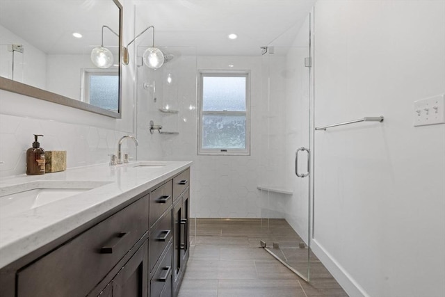 9 Bond St, Boston, MA 02118 - bathroom featuring a shower stall and double vanity