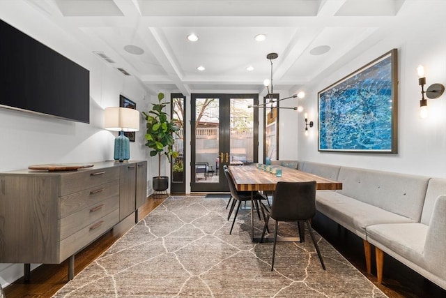 9 Bond St, Boston, MA 02118 - dining room featuring coffered ceiling, wood finished floors, french doors, recessed lighting, and beam ceiling