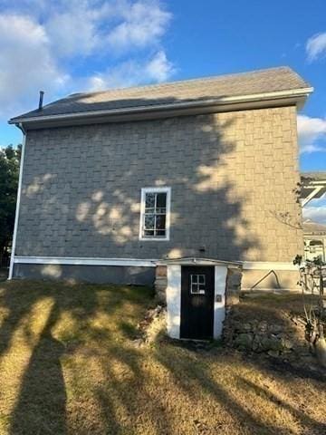 678 School St, Webster, MA 01570 - view of side of home featuring a lawn