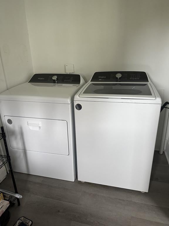 678 School St, Webster, MA 01570 - washroom featuring washer and clothes dryer and dark wood-style flooring