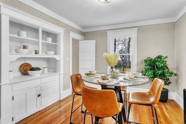 dining room with light hardwood / wood-style flooring