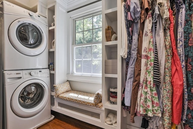 1 Columbine Rd, Milton, MA 02186 - laundry room featuring stacked washer and clothes dryer, plenty of natural light, and dark wood finished floors