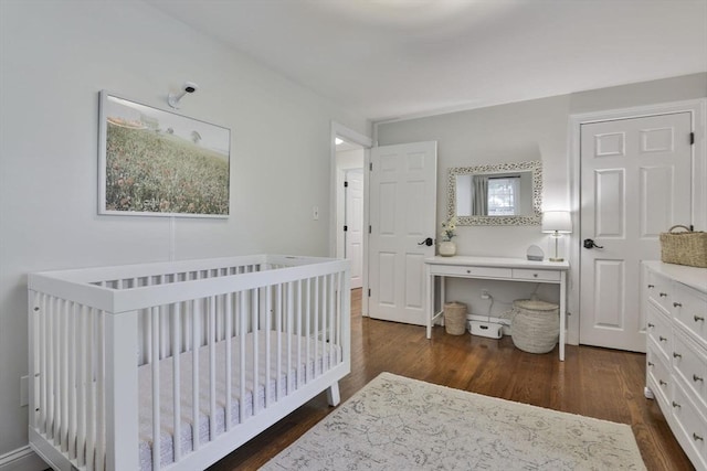 1 Columbine Rd, Milton, MA 02186 - bedroom featuring dark wood finished floors and a crib
