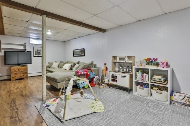 1 Columbine Rd, Milton, MA 02186 - game room featuring a drop ceiling, wood finished floors, and a baseboard heating unit