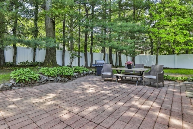 1 Columbine Rd, Milton, MA 02186 - wooden terrace with a patio, outdoor dining space, and a fenced backyard