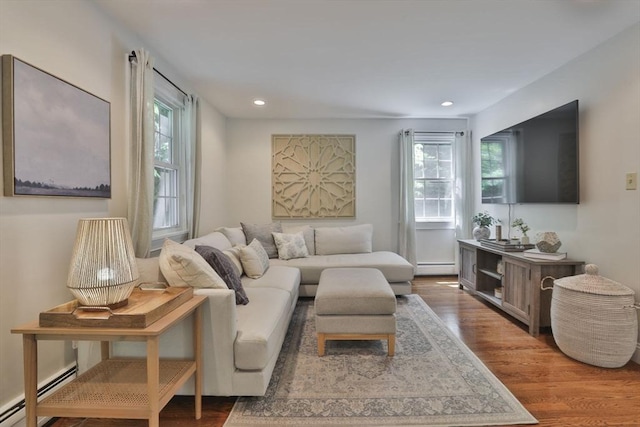 1 Columbine Rd, Milton, MA 02186 - living area featuring a baseboard radiator, wood finished floors, a baseboard heating unit, and recessed lighting