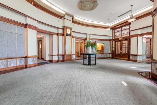 10 Rogers Unit 1119, Cambridge, MA 02142 - community lobby with a towering ceiling and a decorative wall