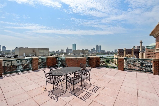 10 Rogers Unit 1119, Cambridge, MA 02142 - view of patio / terrace featuring a skyline view