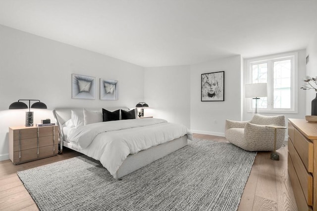 10 Rogers Unit 1119, Cambridge, MA 02142 - bedroom featuring light wood finished floors and baseboards