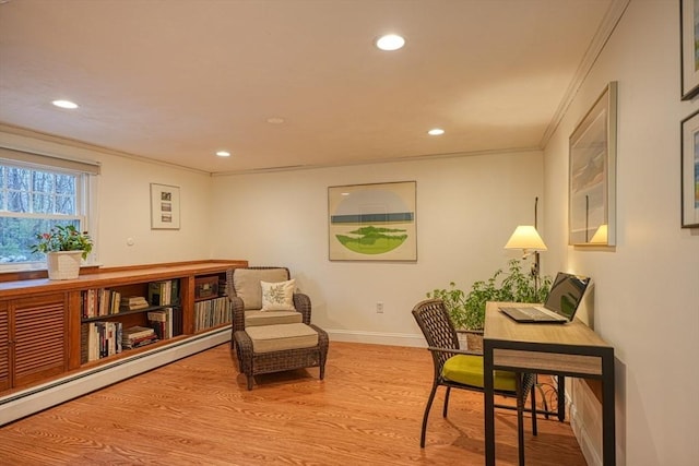 sitting room featuring crown molding, recessed lighting, baseboard heating, wood finished floors, and baseboards