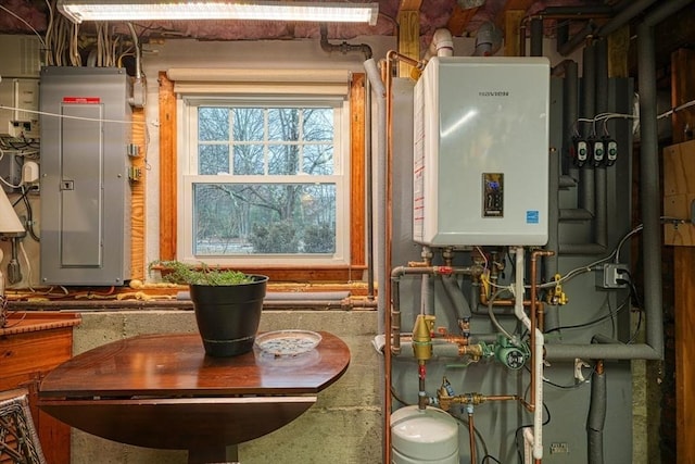 utility room with water heater and electric panel