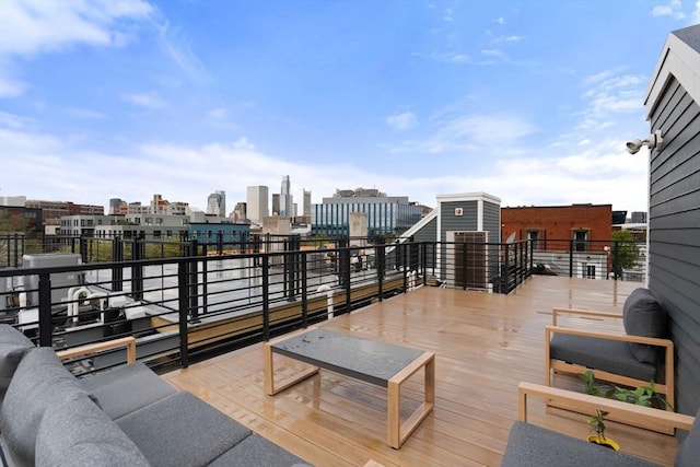 view of patio featuring a city view and a balcony