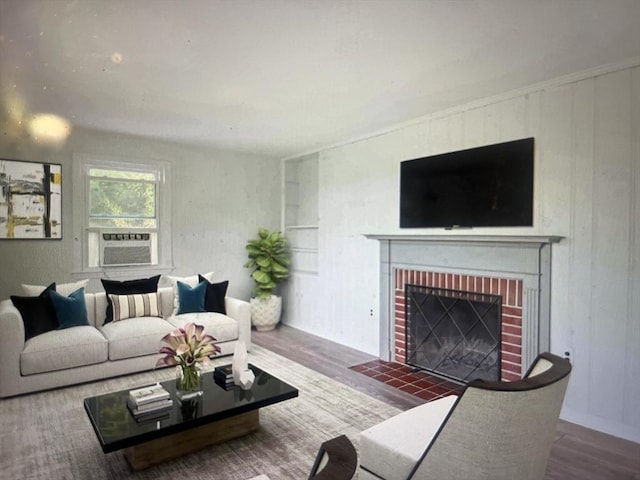 35 Marsh Ave, Worcester, MA 01605 - living area featuring wood finished floors, a brick fireplace, and cooling unit