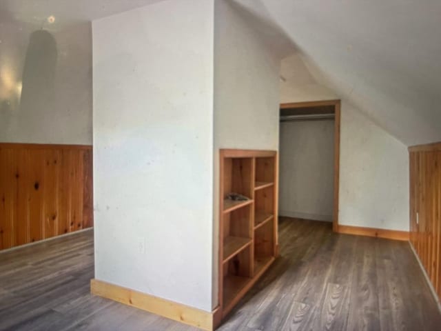 35 Marsh Ave, Worcester, MA 01605 - bonus room featuring vaulted ceiling, wood walls, and wood finished floors