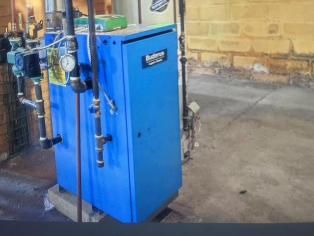 35 Marsh Ave, Worcester, MA 01605 - utility room featuring a heating unit